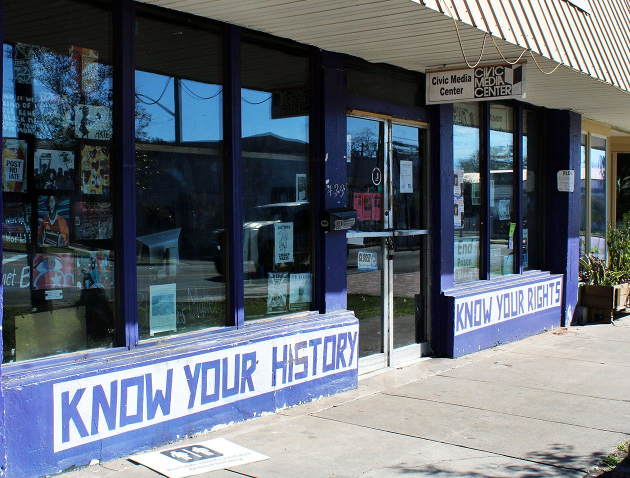 The exterior of the Civic Media Center in downtown Gainesville on Thursday, Jan. 28, 2021. A yellow and black donation box can be found outside of the Civic Media Center where people can drop books off to contribute to the Gainesville Books to Prisoners initiative.