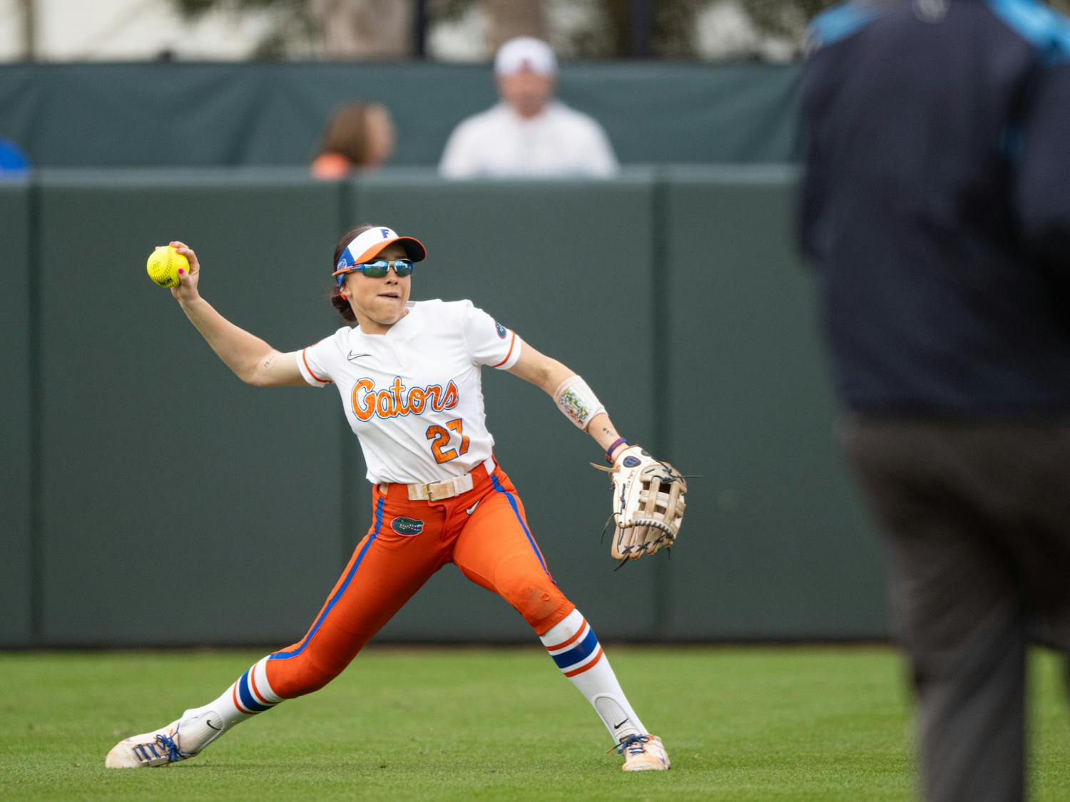 Florida Gators outfielder Kendra Falby (27) throws the ball in a softball game against Providence in Gainesville, Fla., on Friday, Feb. 14, 2025.