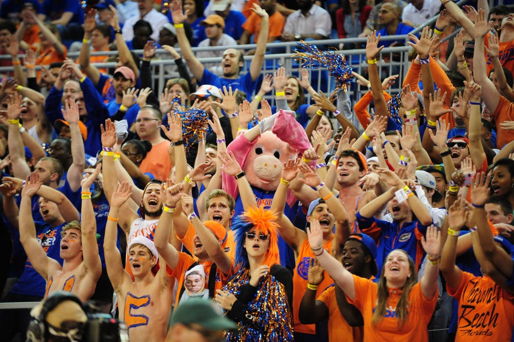 Gators fans cheer during No. 19 Florida's 67-61 win against No. 13 Kansas on Dec. 10 in the O'Connell Center.