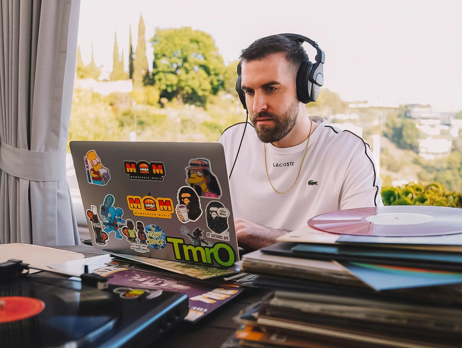 Sean Momberger producing songs in his studio in Los Angeles, California.