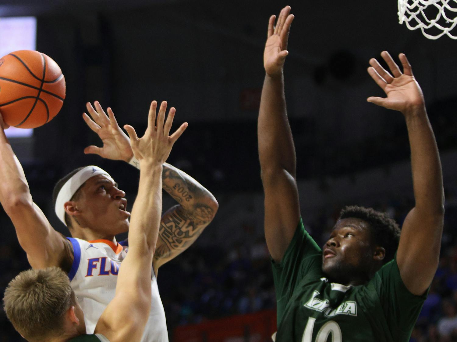 Sophomore guard Riley Kugel goes up for a layup during the Florida Gators' 93-73 win against the Loyola Maryland Greyhounds on Monday, Nov. 6, 2023. 