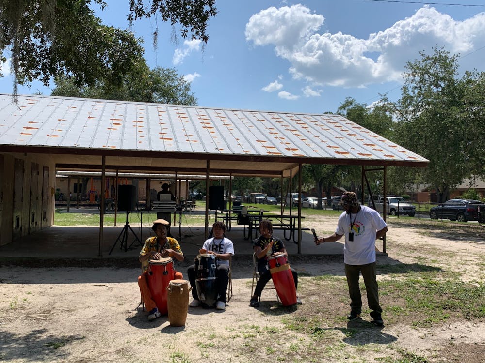 Kofi Horne performs with his band for Gainesville Housing Authorities Juneteenth Black Music Month mash-up event at Woodland Park Thursday, June 16, 2022.