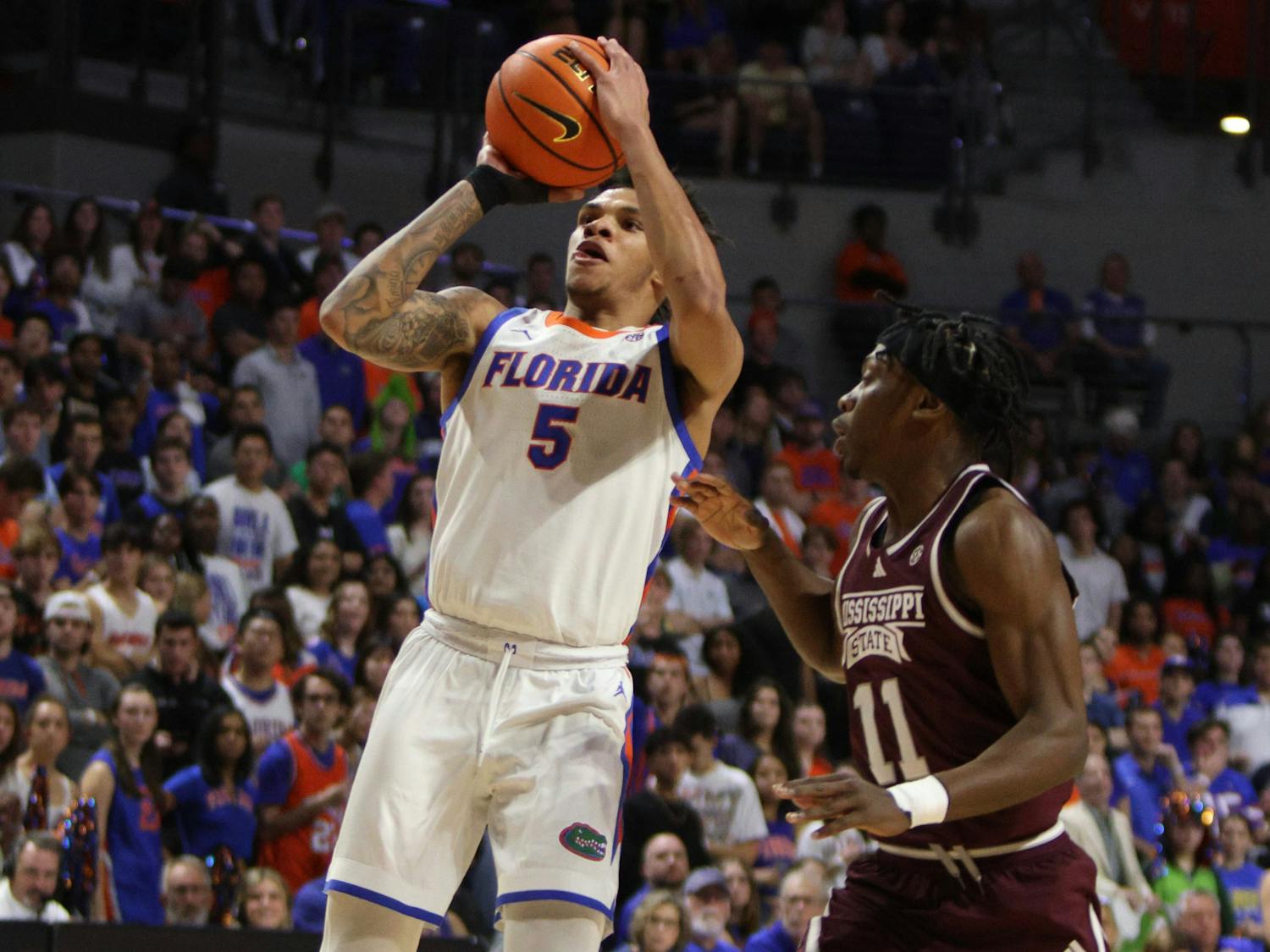 Florida men's basketball guard Will Richard rises up to shoot the ball in the team's win over Mississippi State on Wednesday, January 24, 2024. 
