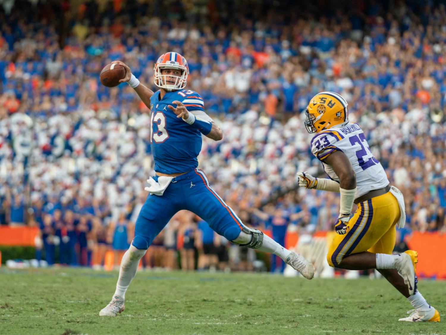 Florida quarterback Feleipe Franks (13) was pressured by LSU defensive players on seven of his nine incompletions in the second half of the Gators’ 27-19 win Saturday.