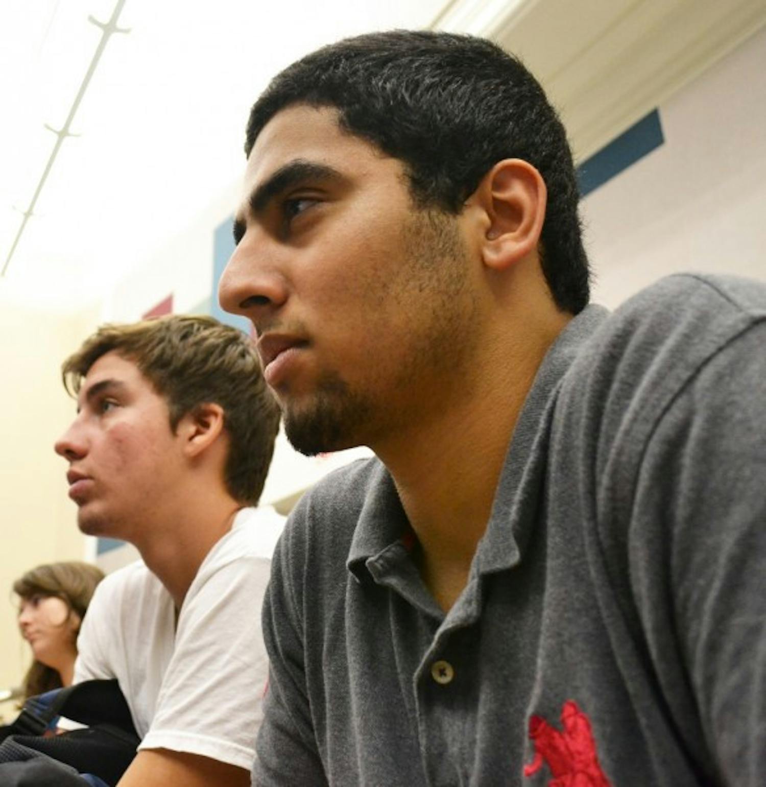 Freshman Adam Samei sits in his statistics class Wednesday during the first day of classes.