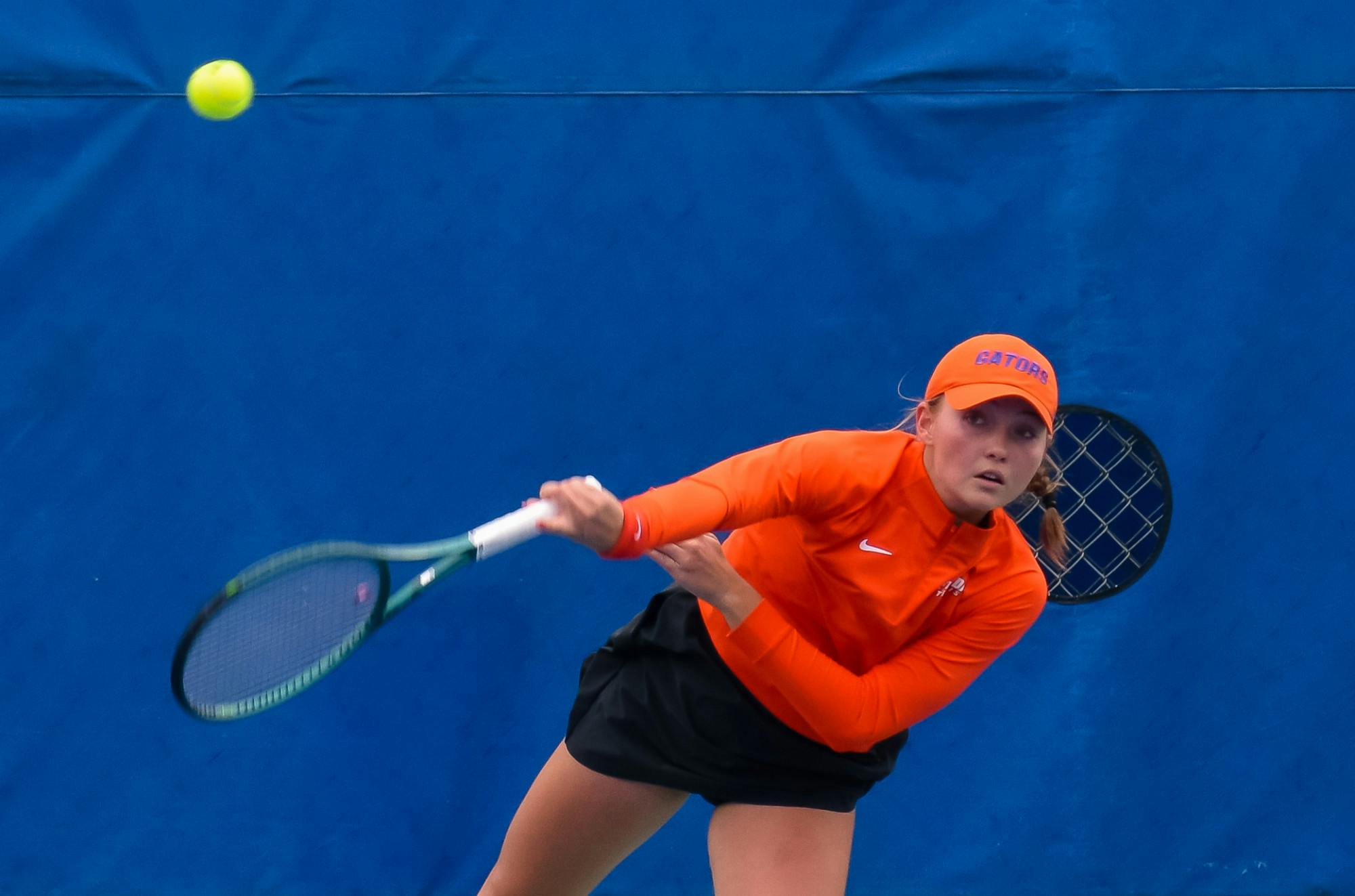 UF Women&#x27;s Tennis player Nikola Daubnerova sends a ball over the net during the Florida Invitational on Jan. 11, 2025. (Credit: Kade Sowers)