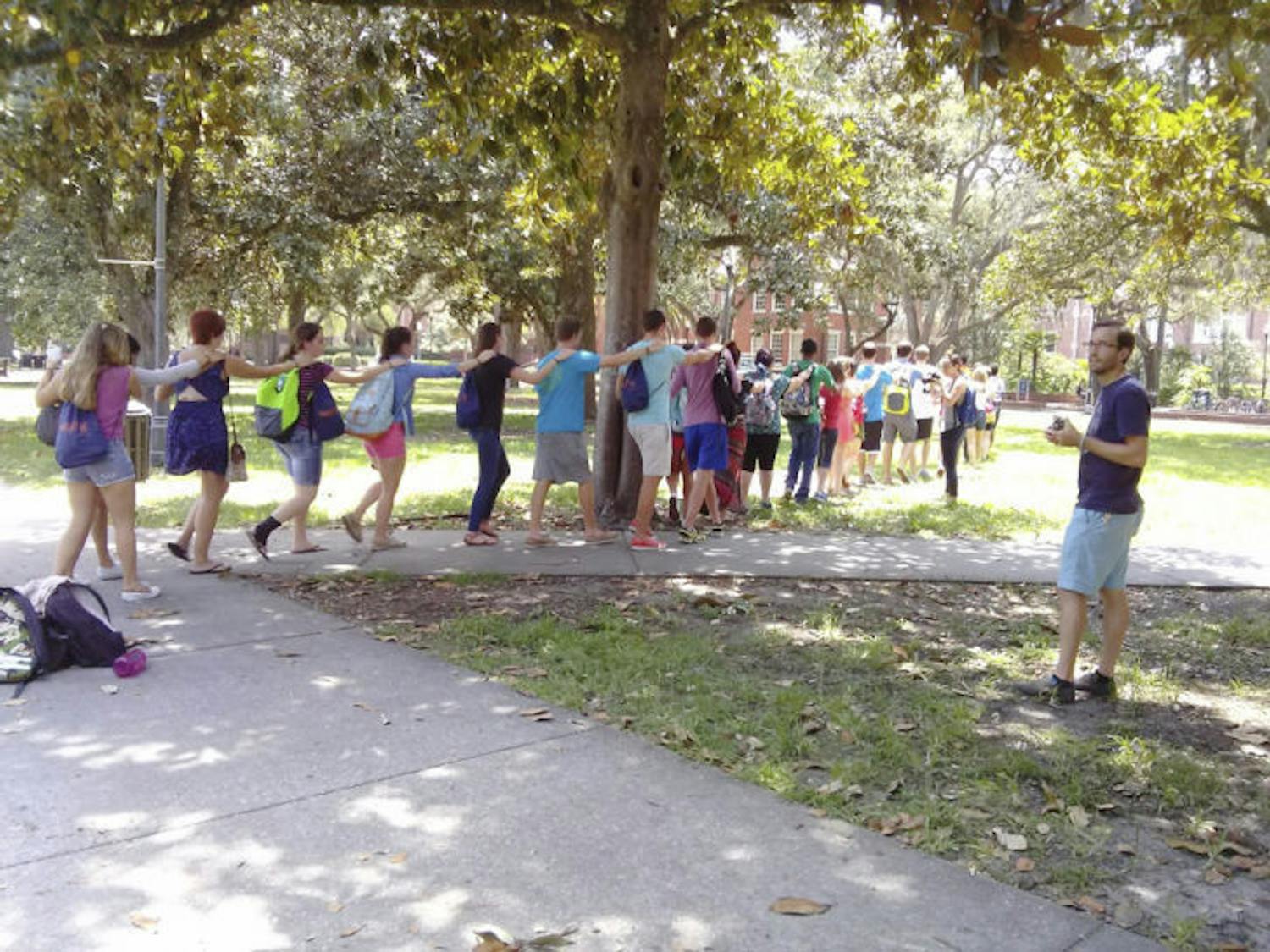 One hundred art and engineering students participated in a dedication ceremony for the newly installed art piece “Moving Water,” by Miami artist Xavier Cortada. 