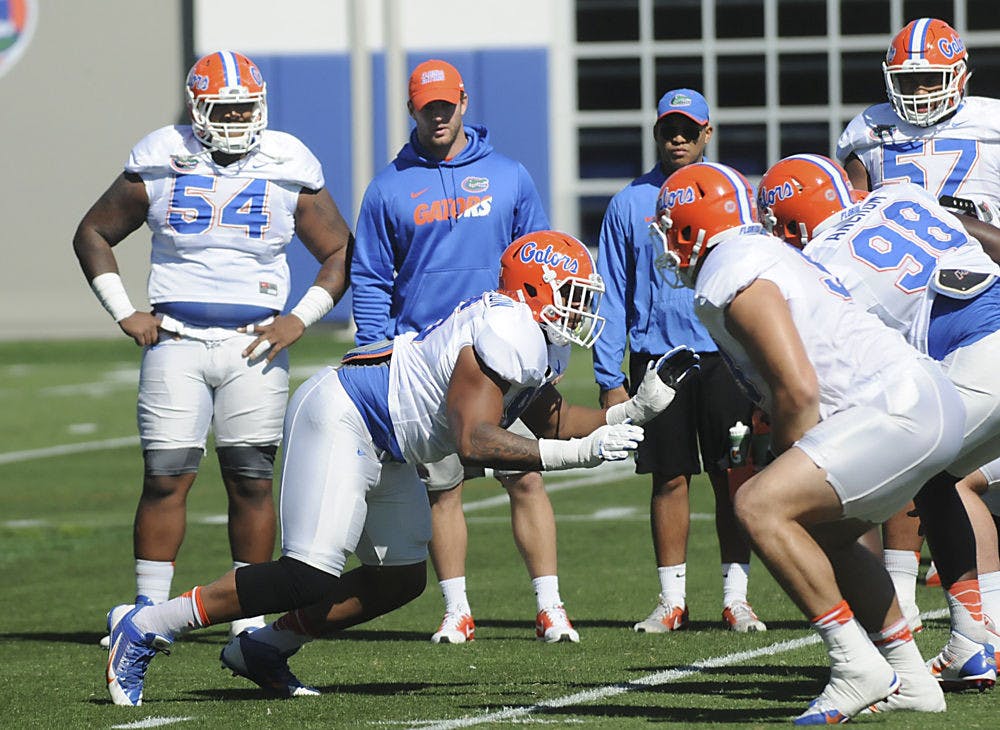 <p>Florida defensive lineman CeCe Jefferson participates in a drill during a Spring practice on March 21, 2016, at the Sanders Football Field.</p>