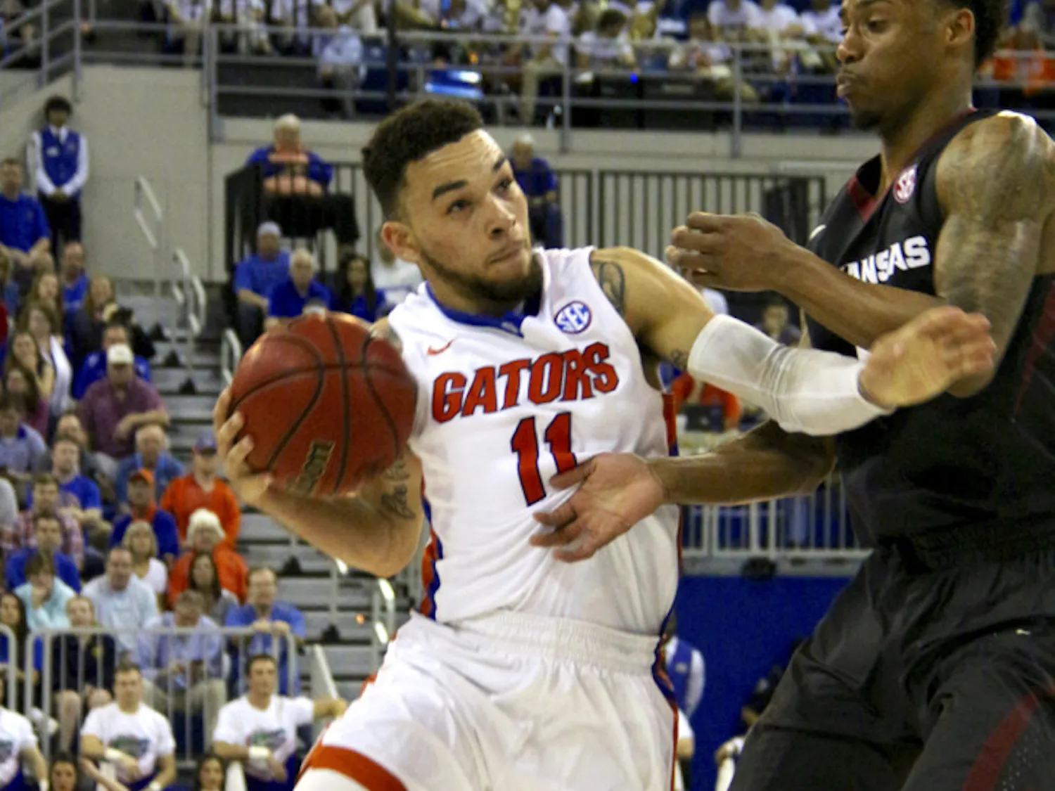 UF guard Chris Chiozza drives into the paint during Florida's 87-83 win over Arkansas on Feb. 3, 2016, in the O'Connell Center.