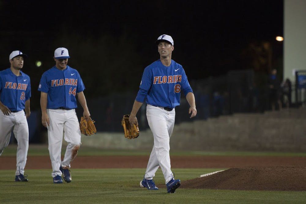 <p>UF outfielder Ryan Larson walks off the field after Florid'a 2-0 win over Miami on Feb. 25, 2017, at McKethan Stadium.</p>