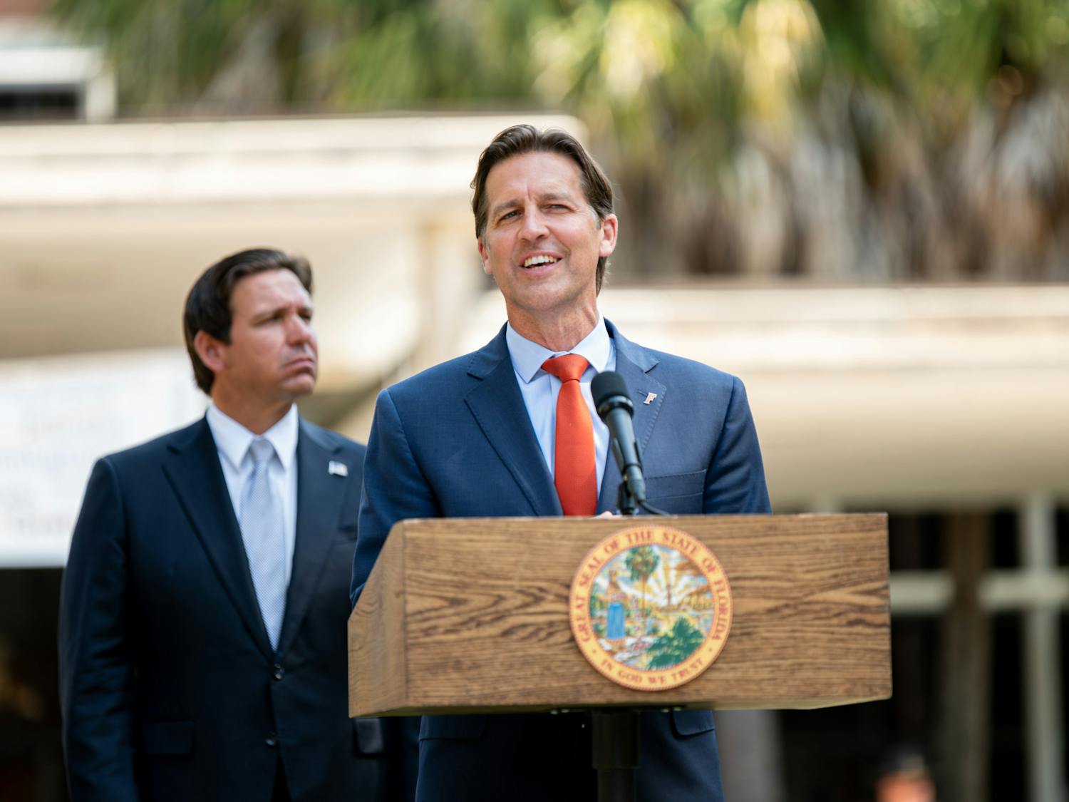 Outgoing UF president Ben Sasse speaks in front of Governor Ron DeSantis on Wednesday, May 8, 2024.