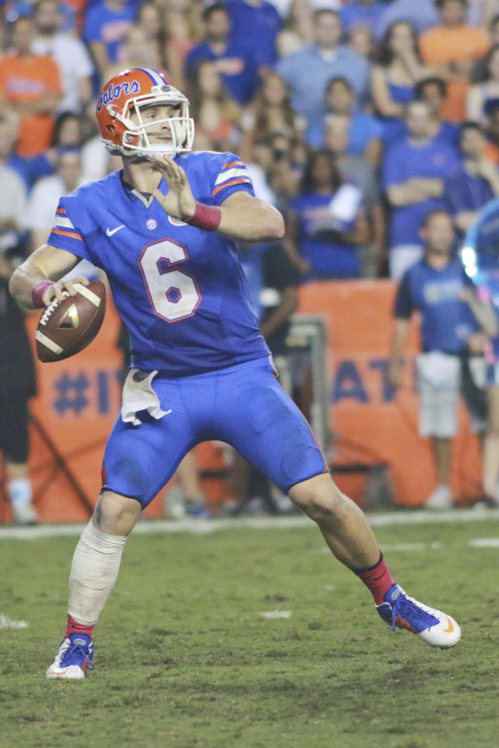 <p>Jeff Driskel attempts a pass during UF's 30-27 loss to LSU on Saturday at Ben Hill Griffin Stadium.</p>