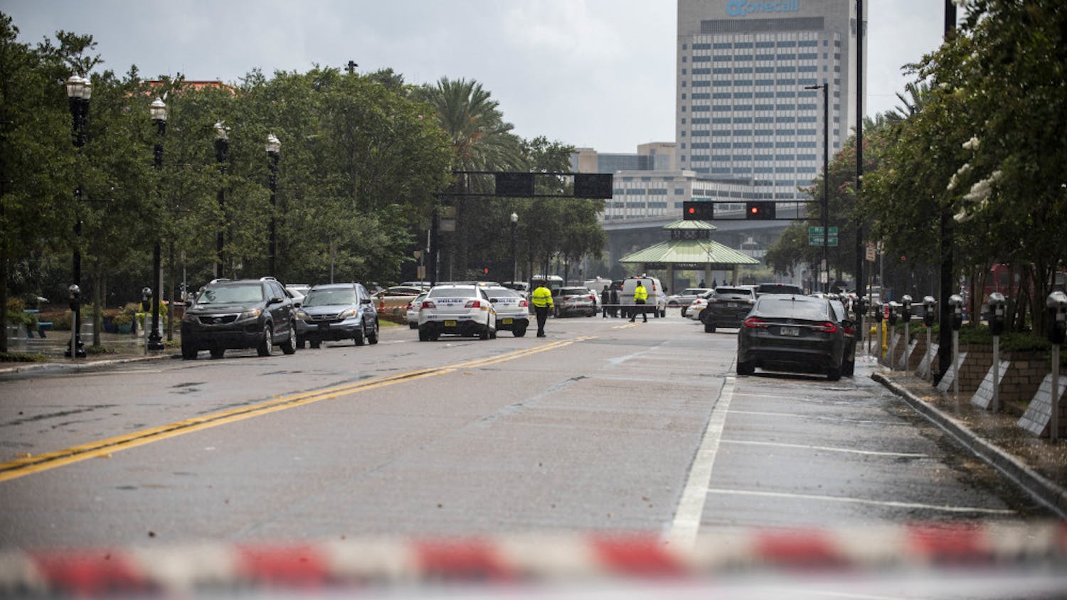 Police barricade a street near the Jacksonville Landing in Jacksonville, Fla., Sunday, Aug. 26, 2018. Florida authorities are reporting multiple fatalities after a mass shooting at the riverfront mall in Jacksonville that was hosting a video game tournament. (AP Photo/Laura Heald)