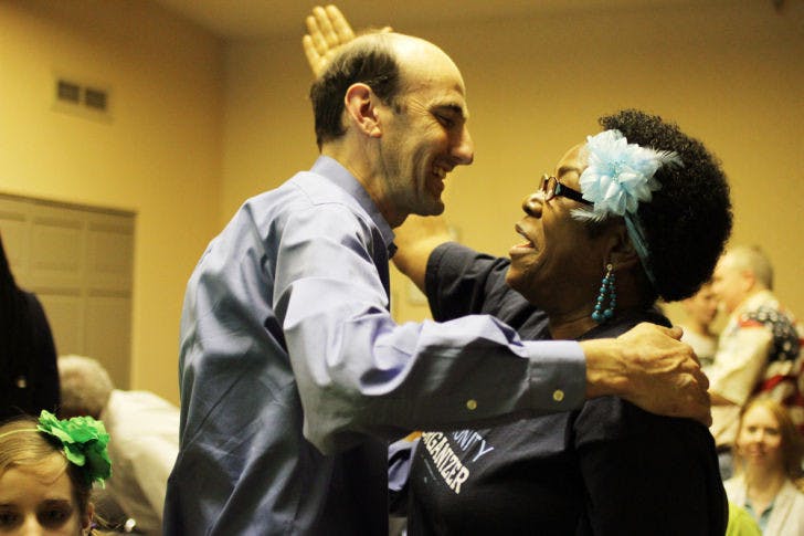 Commissioner-elect Randy Wells, 45, celebrates his victory at the Supervisor of Elections office Tuesday evening. Wells won with 53.6 percent of the vote.