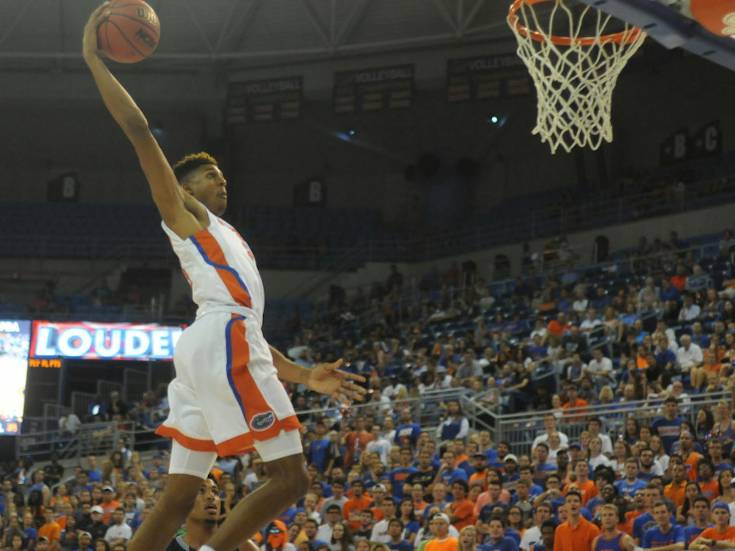 UF forward Devin Robinson soars for a dunk during Florida's 89-42 exhibition win against Palm Beach Atlantic on Nov. 5, 2015, in the O'Connell Center.