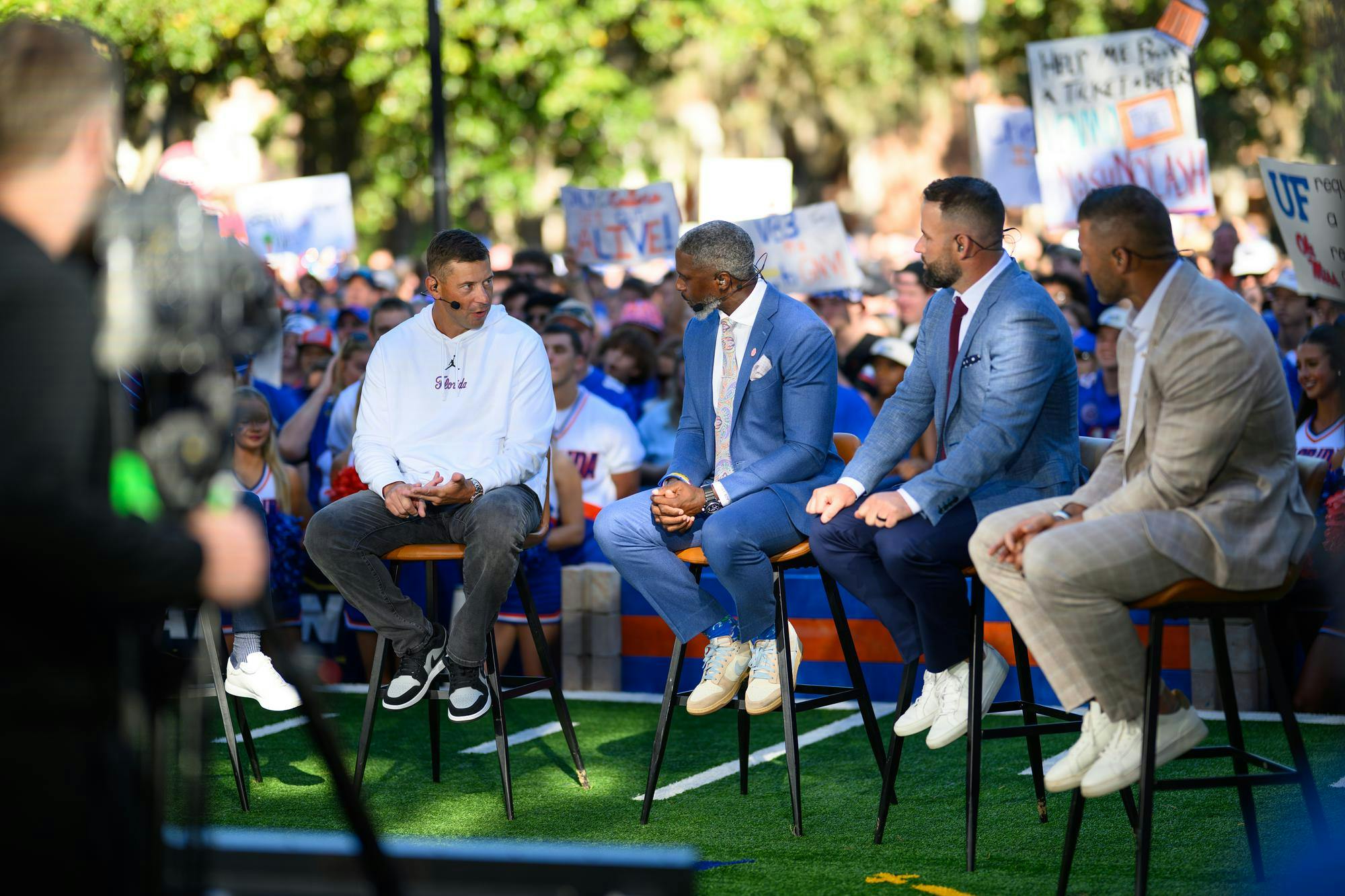 Florida head coach Jon Sumrall (left) talks to the hosts during SEC Nation’s show on Plaza of the Americas before Florida hosts Ole Miss, Saturday, Sept. 26, 2026, in Gainesville, Fla.