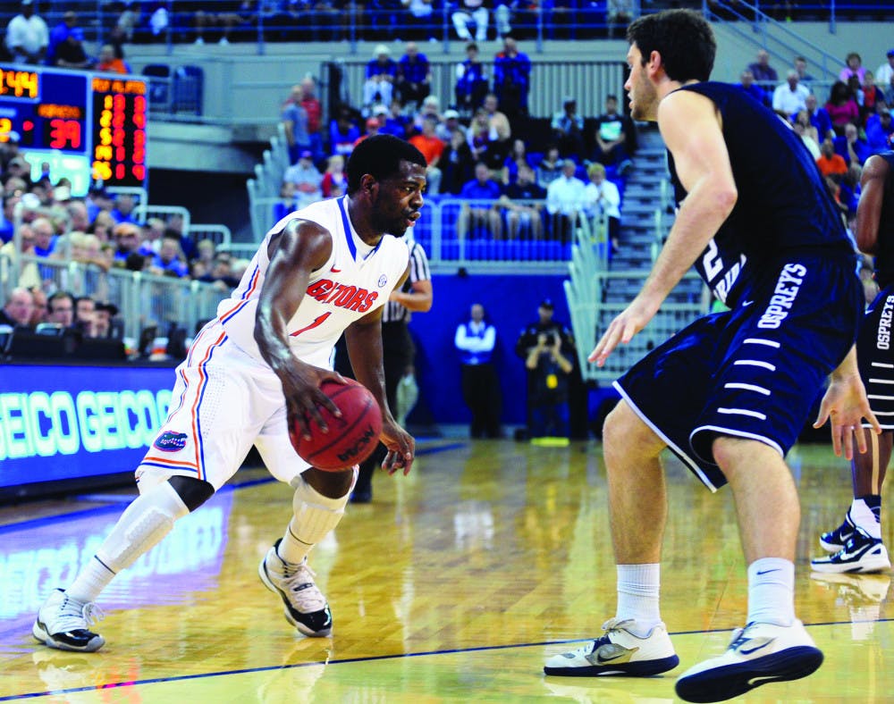 <p>Eli Carter dribbles the ball during Florida’s 77-69 win against North Florida on Nov. 1 in the O’Connell Center. Carter plans to receive a medical redshirt this season.</p>
