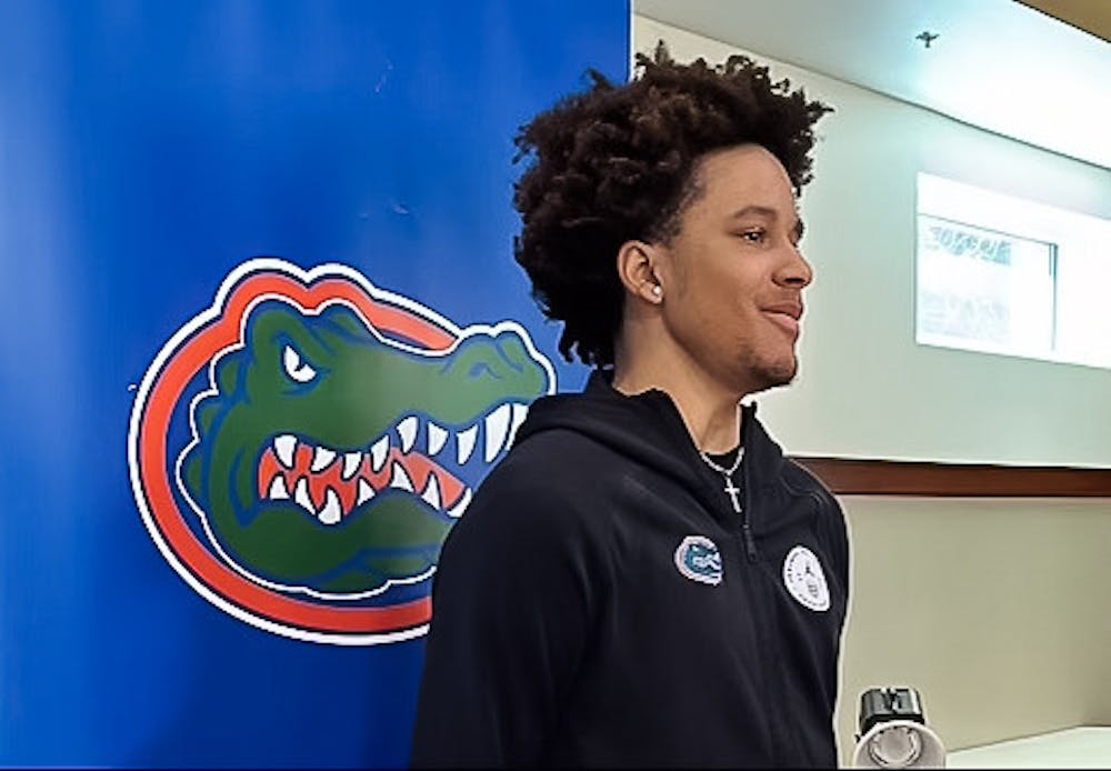 <p>UF basketball player and freshman Isaiah Brown poses for a photograph.</p>