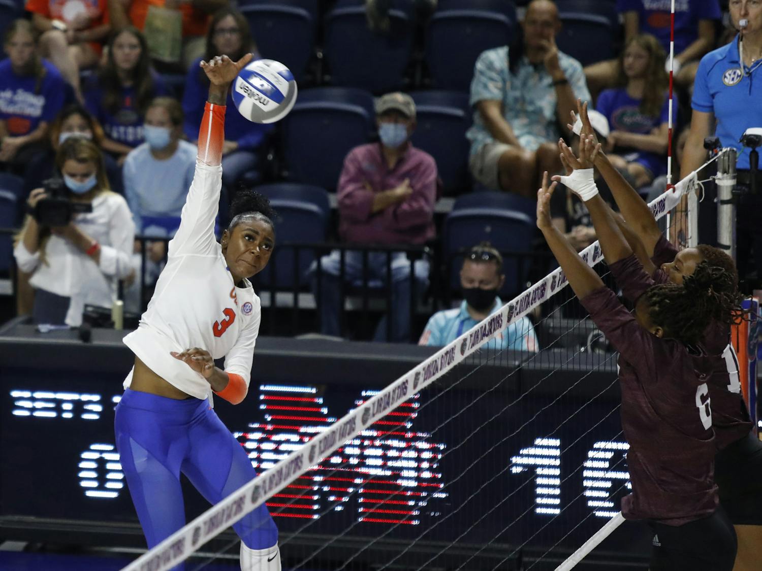 Florida outside hitter T&#x27;ara Ceasar spikes a ball toward the Mississippi State defense on Friday night in the O&#x27;Connell Center. 