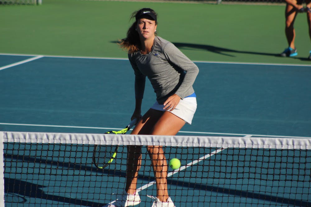 <p>Anna Danilina watches the ball during the 2016 ITA Regional Championships at the Ring Tennis Complex.</p>