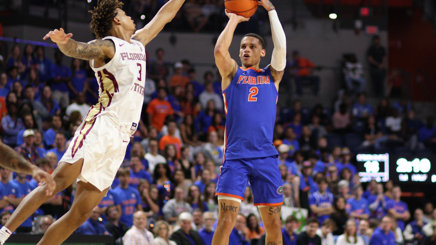 Sophomore guard Riley Kugel attempts a jumper in the Gators' 89-68 win against the Florida State Seminoles on Friday, Nov. 17, 2023.
