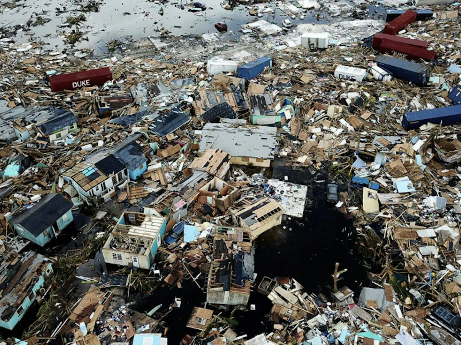 Extensive damage and destruction in the aftermath of Hurricane Dorian is seen in an area called "The Mud" at Marsh Harbour in Great Abaco Island, Bahamas on Thursday, Sept. 5, 2019. (AL Diaz/Miami Herald via AP)