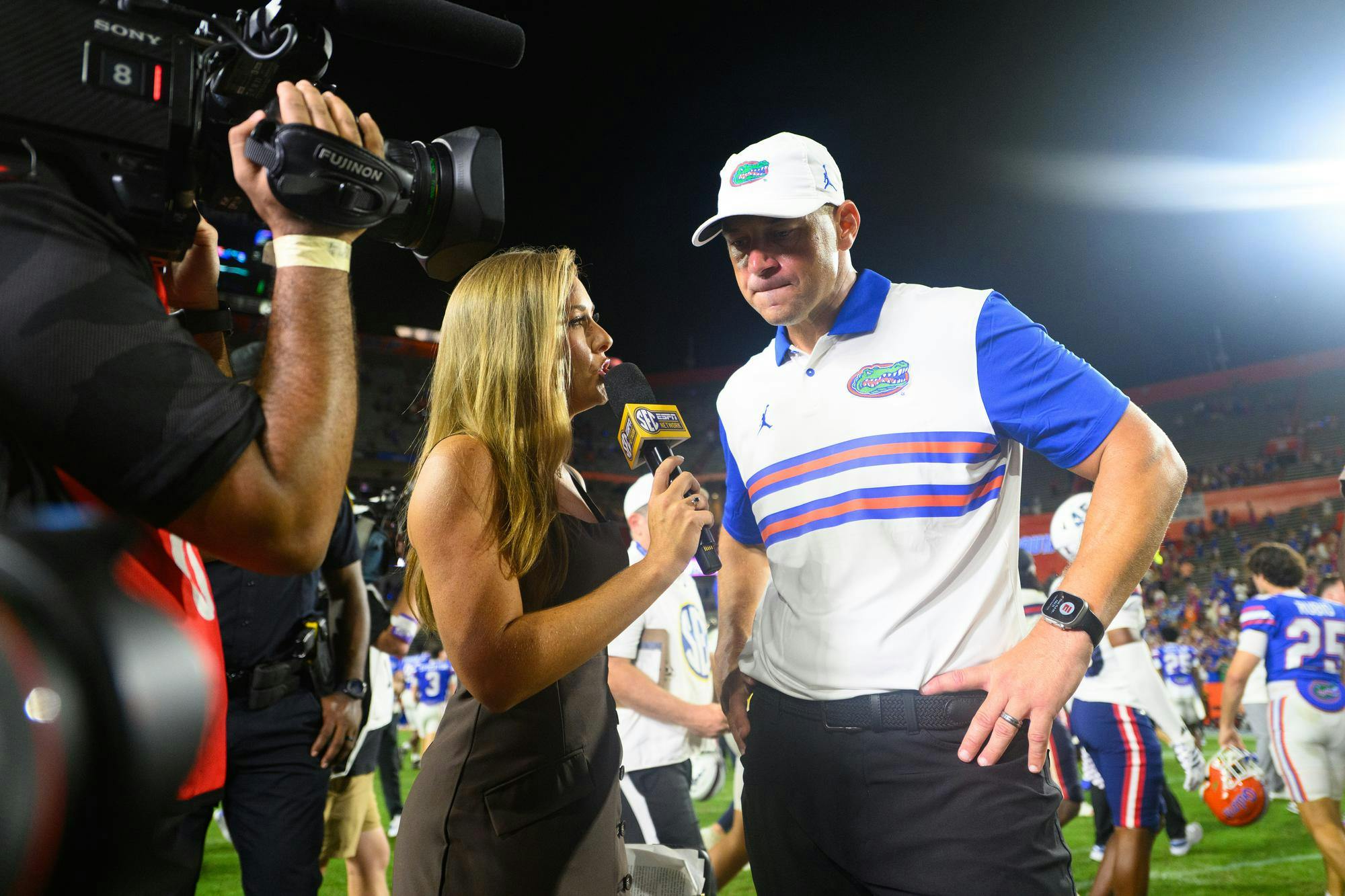 Florida head coach Jon Sumrall is interviewed by ESPN’s Taylor Davis after the second half of an NCAA college football game against FAU, Saturday, Sept. 5, 2026, in Gainesville, Fla.