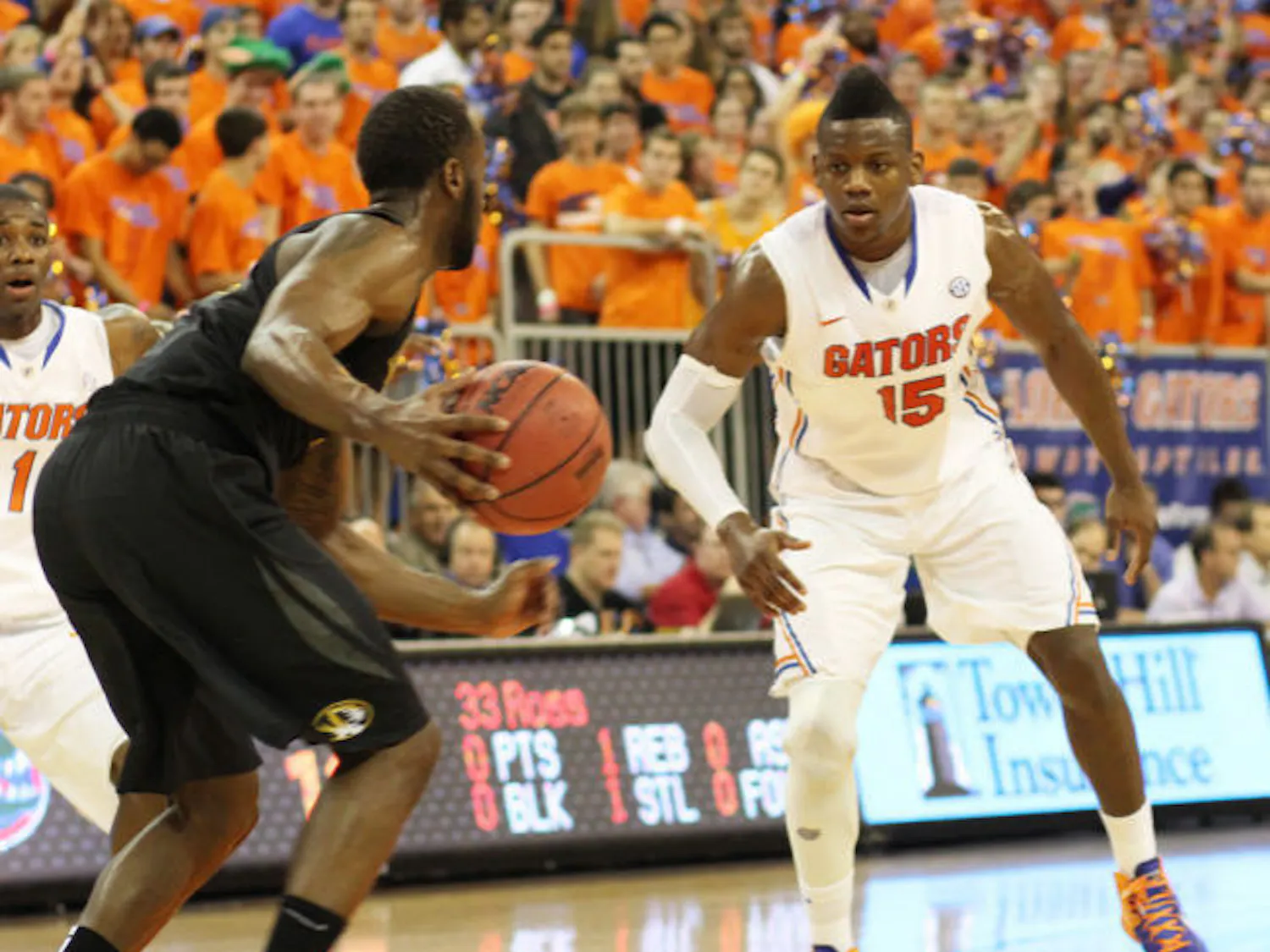 Junior forward Will Yeguete (15) plays defense during Florida’s 83-52 victory against Missouri on Saturday in the O’Connell Center. Yeguete will miss 4-6 weeks with bone chips in his right knee.