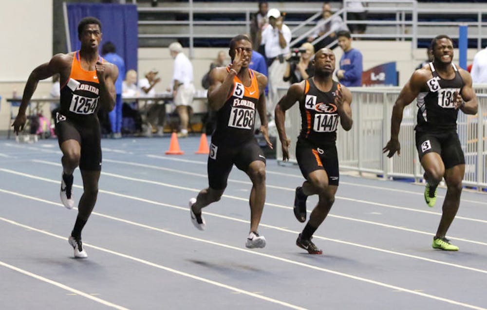 <p>Marquis Dendy (far left) races in the 55m on Jan. 17, 2013, during the Gator Invitational in the O’Connell Center. Dendy finished first in the long jump at the Texas Relays.</p>