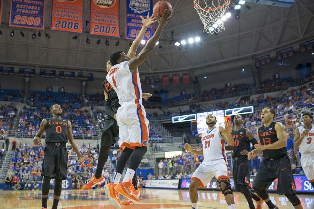 <p>Eli Carter goes for a layup during Florida's loss to Miami on Monday in the O'Connell Center.</p>