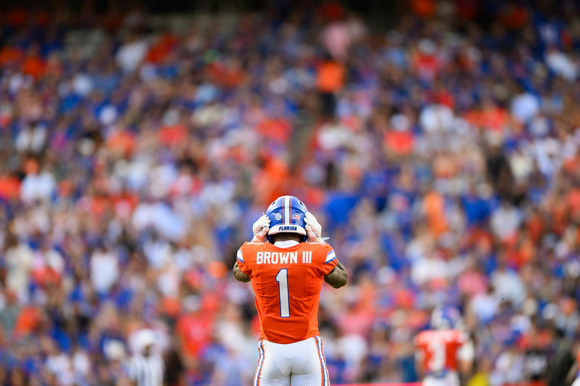 Florida wide receiver Vernell Brown III (1) fixes his helmet during the first half of an NCAA college football game against Campbell, Saturday, Sept. 12, 2026, in Gainesville, Fla.