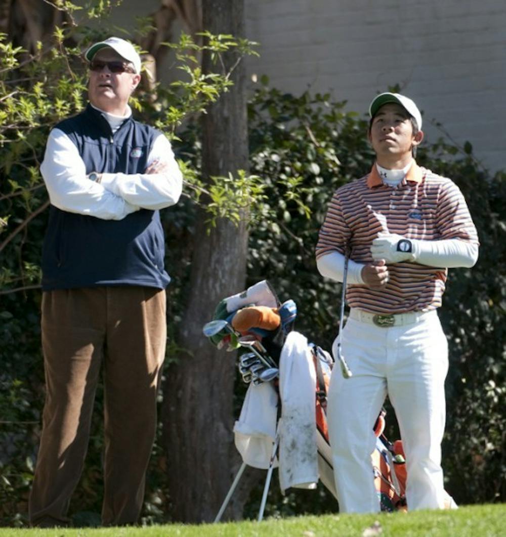 <p>Gators golf coach Buddy Alexander (left) is tasked with replacing his senior leadership, including standout Bank Vongvanij (right).</p>