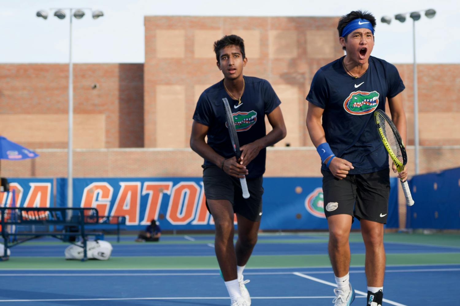 Sophomore Tanapatt Nirundorn (right) and freshman Adhithya Ganesan (left) sealed a doubles point in the Gators men's tennis team's tiebreaker against UNF on Jan. 19, 2024. 