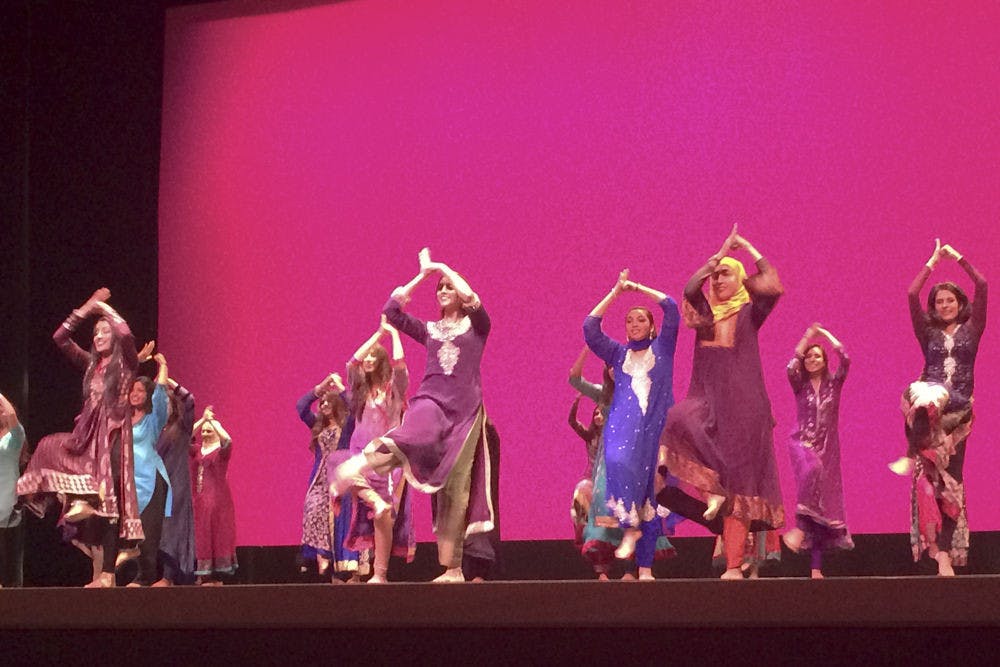 <p>Members of the Nashaa dance group perform a dance to the song “Prem Ratan Dhan Payo,” from the eponymous Bollywood film at the UF Pakistani Students’ Association 20th annual cultural show. Asim Azhar, an emerging pop star from Pakistan, performed at the show for the first time ever.</p>