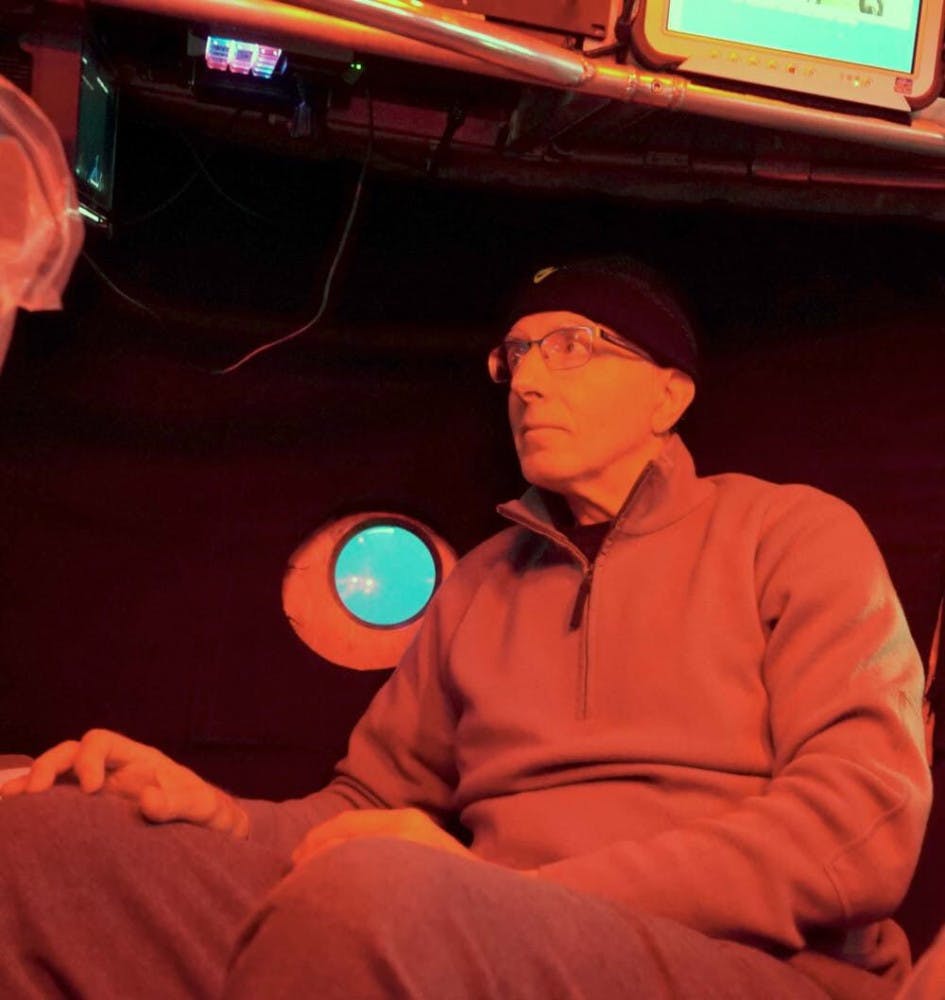 Michael Perfit, 69, a UF geology professor, inside the submarine on a dive.