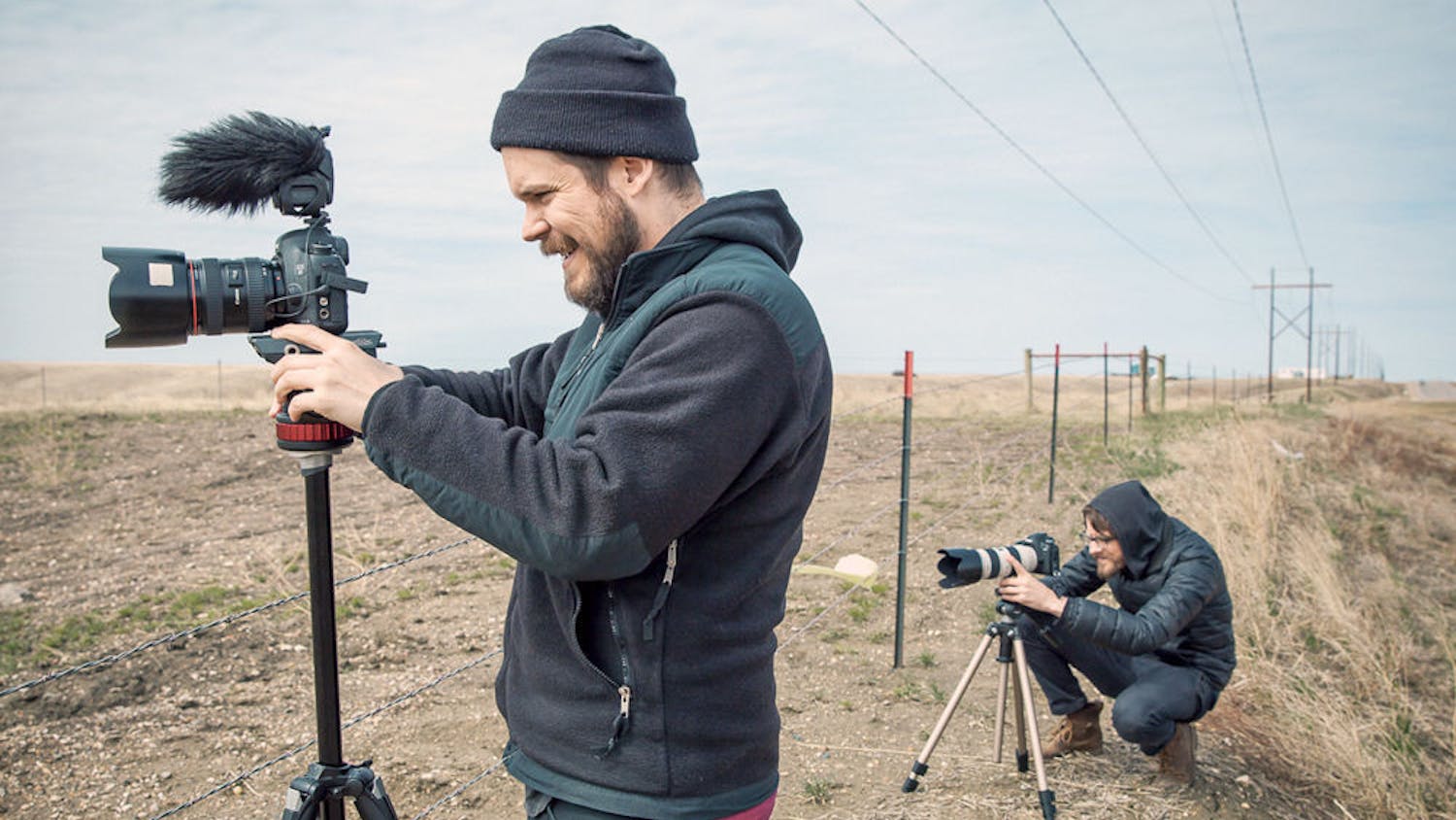 Michael Nichols (left), a UF alum and filmmaker, operates a camera while his friend and partner, Christopher Walker, does the same. Their latest film, titled “Welcome to Leith,” will make its East coast debut at the 2015 Florida Film Festival in April.