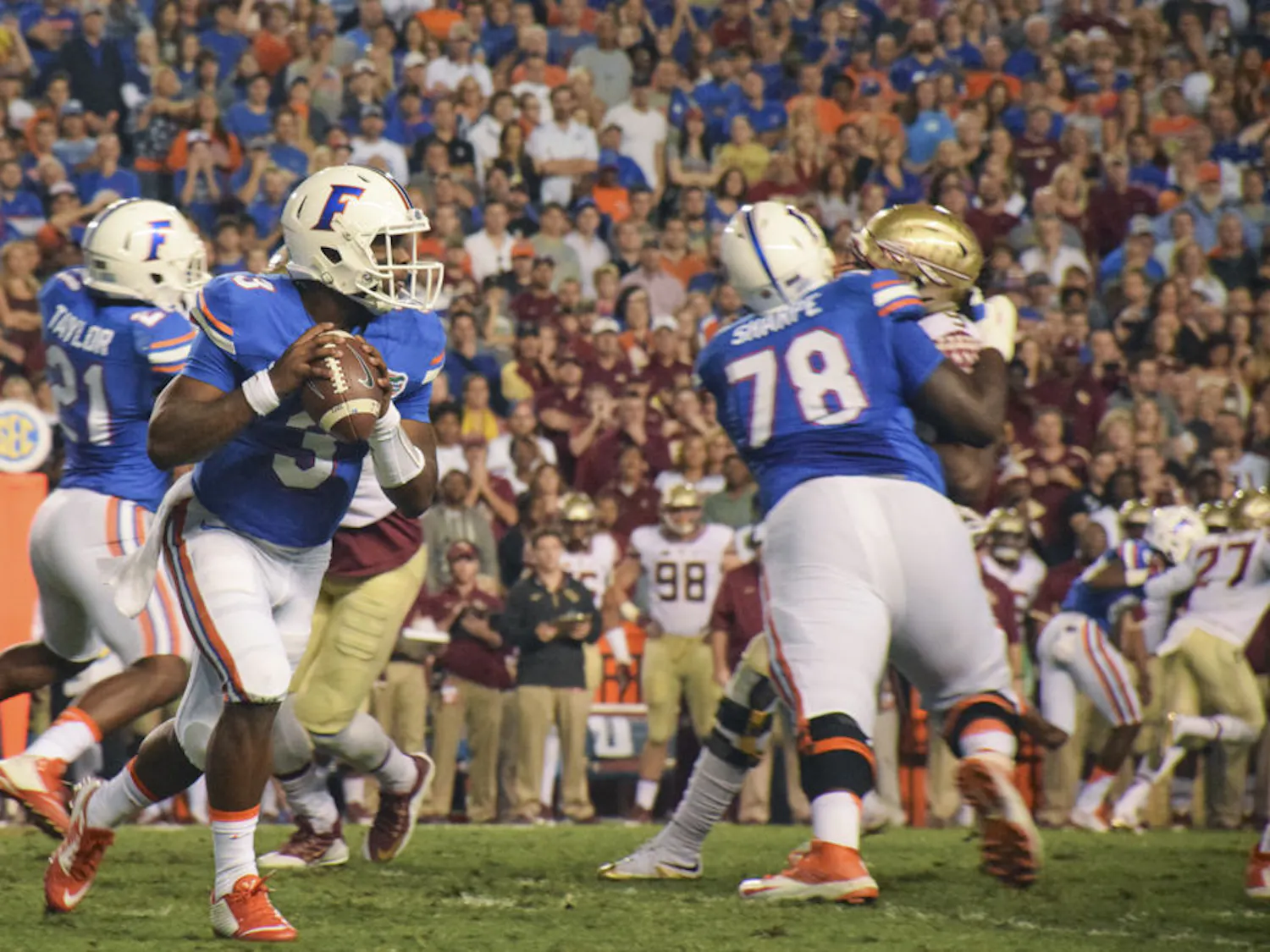 UF quarterback Treon Harris scrambles in the pocket during Florida's 27-2 loss to Florida State on Nov. 28, 2015, at Ben Hill Griffin Stadium.