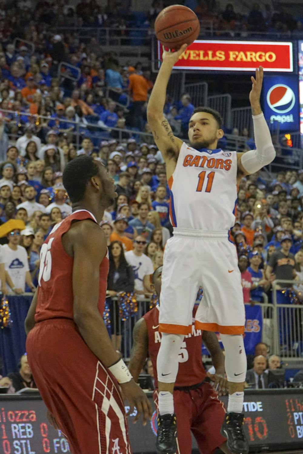 <p>Florida's Chris Chiozza shoots the ball during UF's 61-55 loss to Alabama on Feb. 13, 2016, in the O'Connell Center.</p>