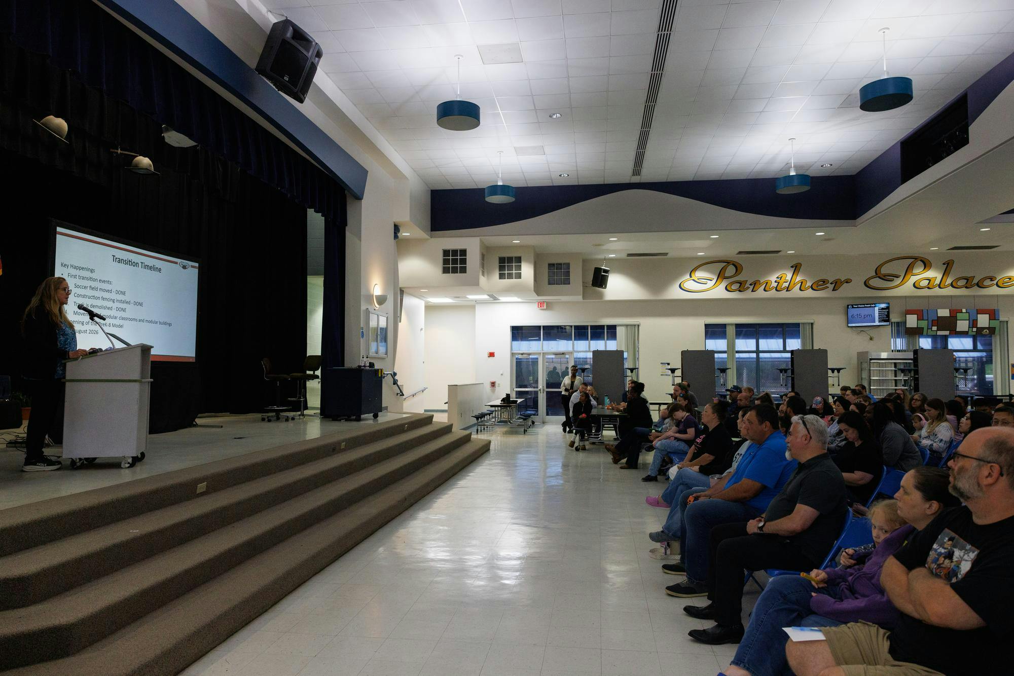 Community members listen during a meeting at Oak View Middle School reguarding the school's transition to a K-8 school, Tuesday, April 7, 2026.