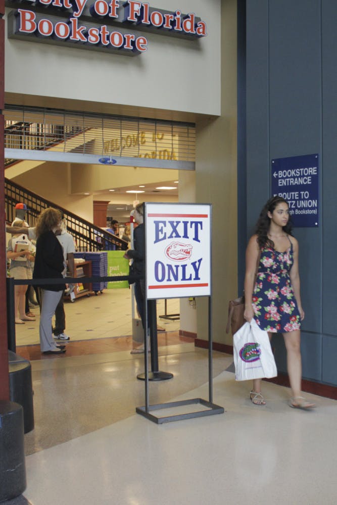 Sussette Rodriguez, a 20-year-old UF journalism junior, leaves the UF bookstore on Aug. 25, 2015.