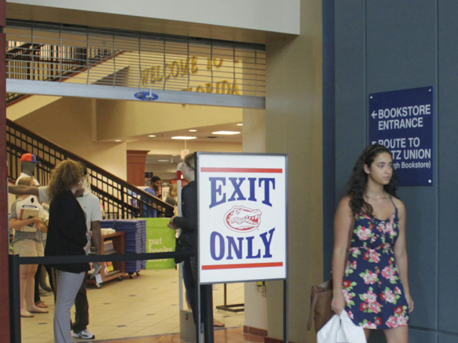 Sussette Rodriguez, a 20-year-old UF journalism junior, leaves the UF bookstore on Aug. 25, 2015.