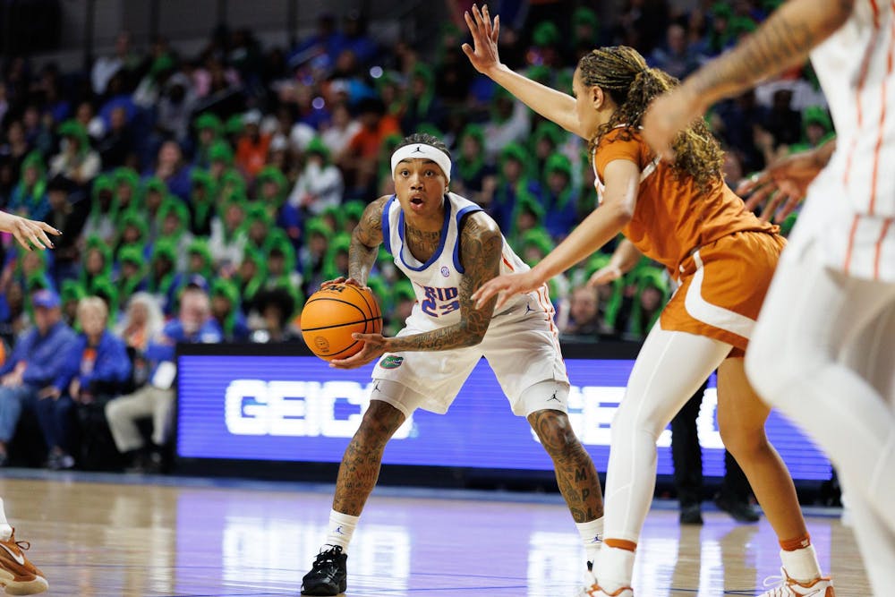 Florida guard Liv McGill (23) holds the ball during the first half of an NCAA basketball game against Texas, Thursday, Jan. 29, 2026, in Gainesville, Fla.