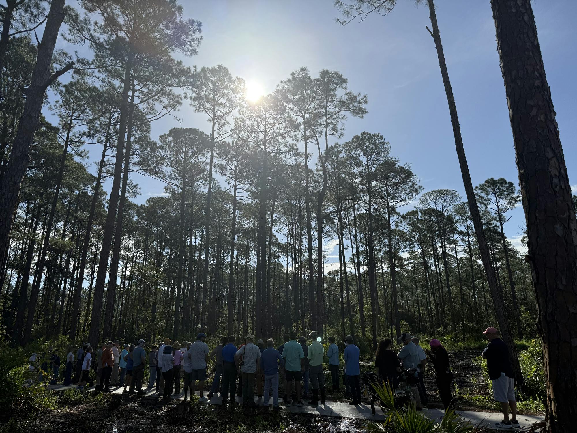 People attend the Black Lake Preserve Ribbon Cutting, Friday, August 21, 2026, in Melrose, Fla.