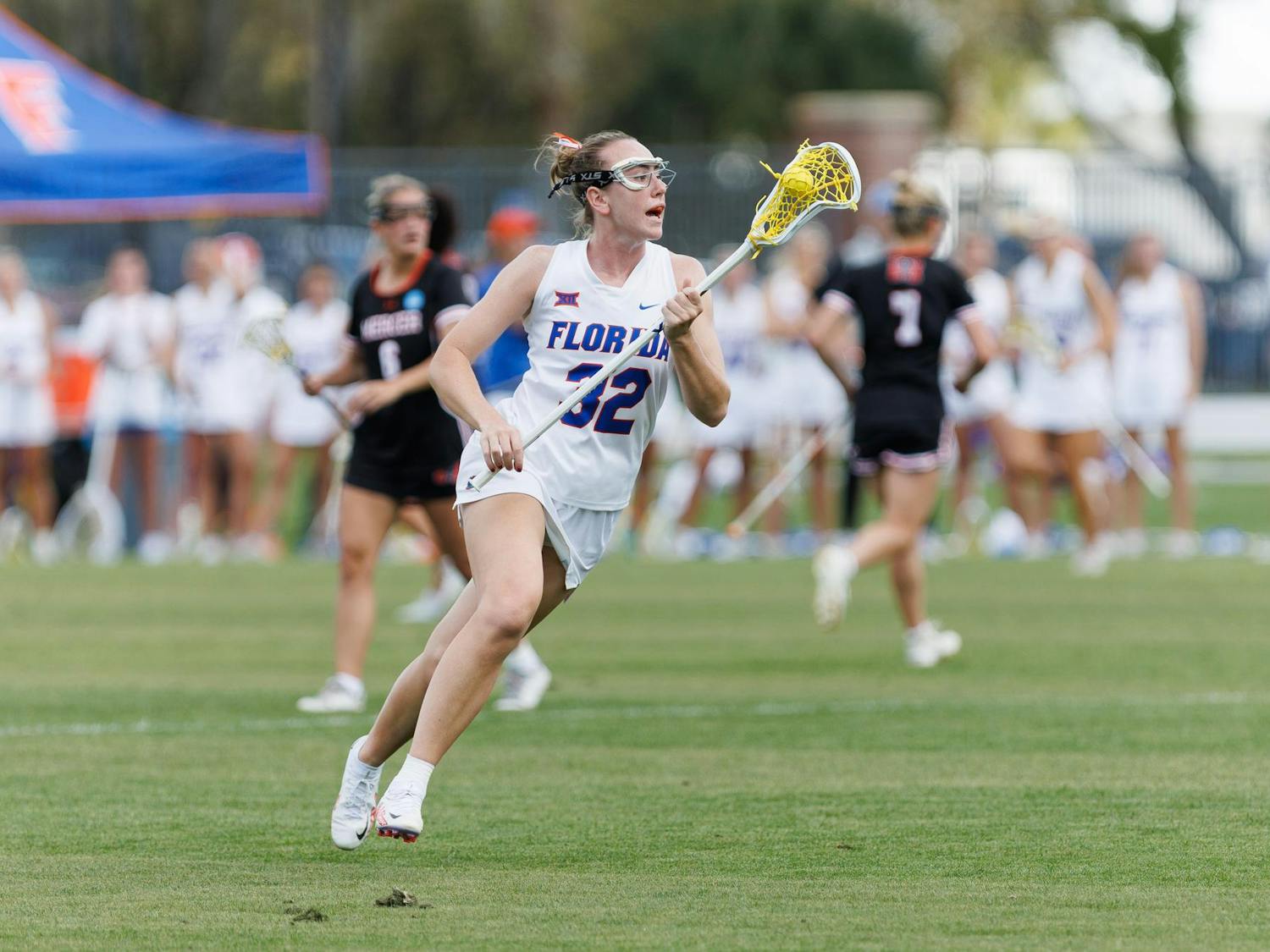 Florida attacker Ava Tighe (32) yells during the first quarter of an NCAA women’s lacrosse gmae against Mercer, Saturday, March 07, 2026, in Gainesville, Fla.