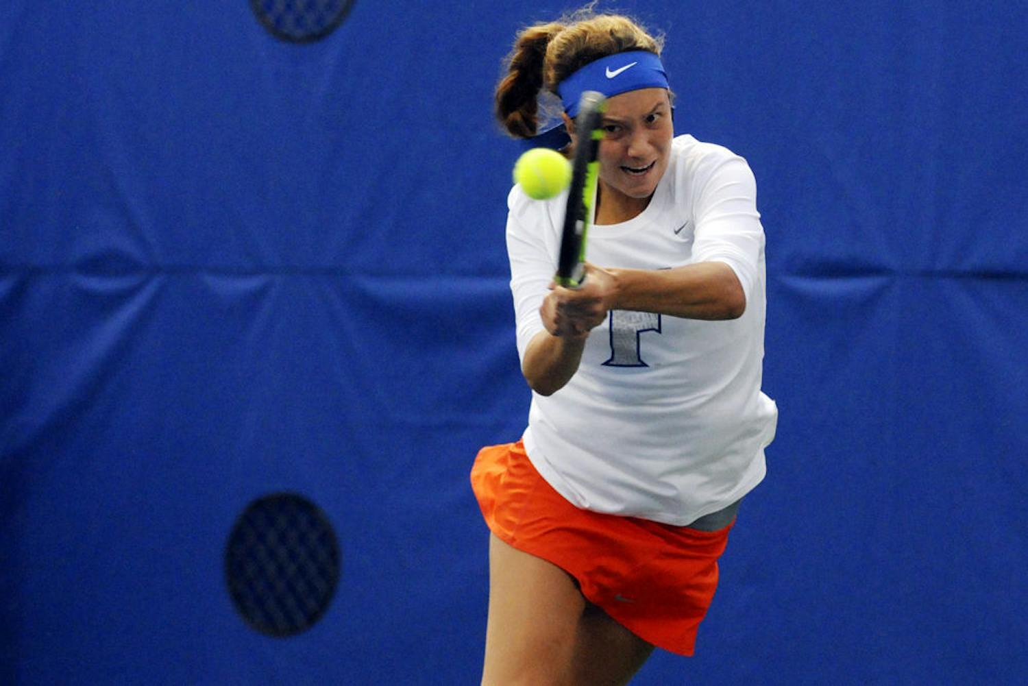UF's Anna Danilina returns a ball during Florida's 6-1 win over USF on Jan. 27, 2016, at the Ring Tennis Complex.