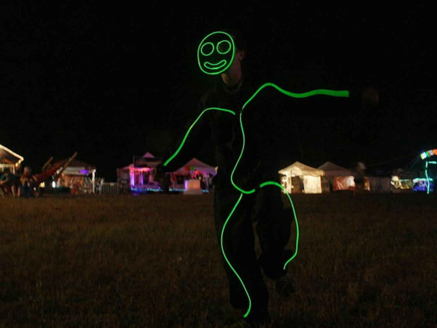 A spirited festival-goer dances at CounterPoint music festival in Atlanta, Ga., Thursday. The three-day electronic-dance-music festival featured artists such as Bassnectar, Skrillex and Pretty Lights.
