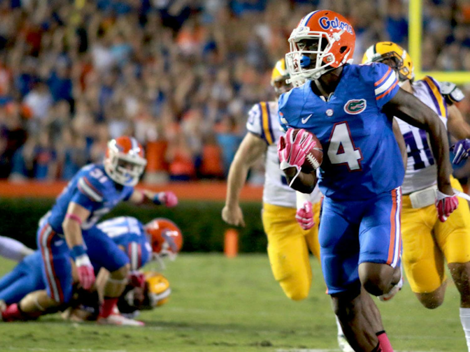 Redshirt senior wide receiver Andre Debose returns a punt for a touchdown during the first quarter of Florida's 30-27 loss to LSU at Ben Hill Griffin Stadium.
