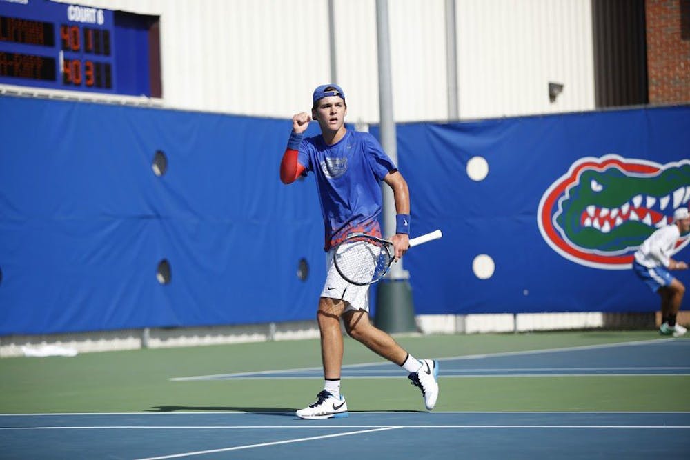 <p>UF sophomore McClain Kessler pumps his fist during Florida's 4-2 win against UCLA on Feb. 5, 2017, at the Ring Tennis Complex.</p>