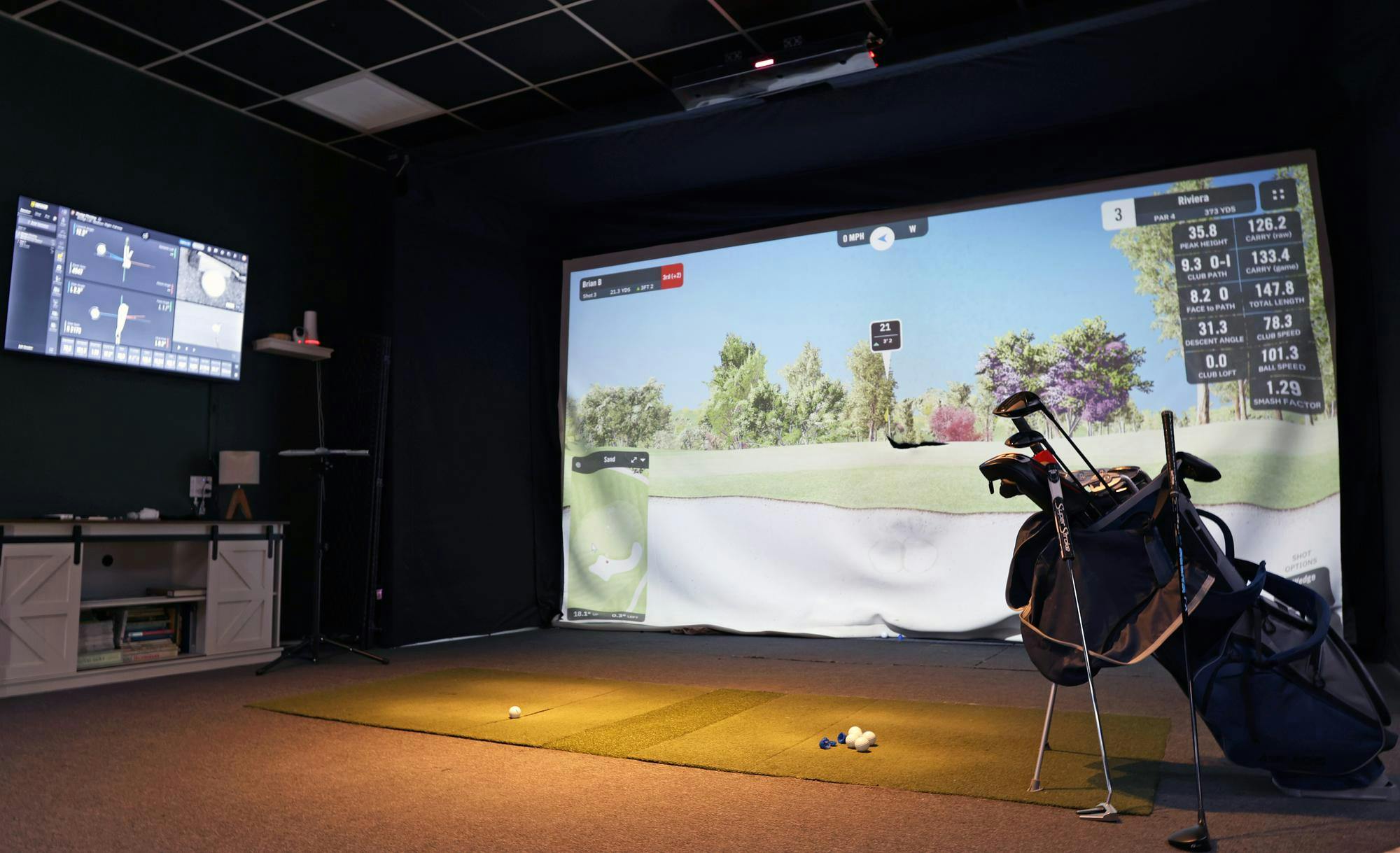An indoor golf simulator is set up inside Future Country Club in Gainesville, Fla., on Sunday, March 1, 2026. 