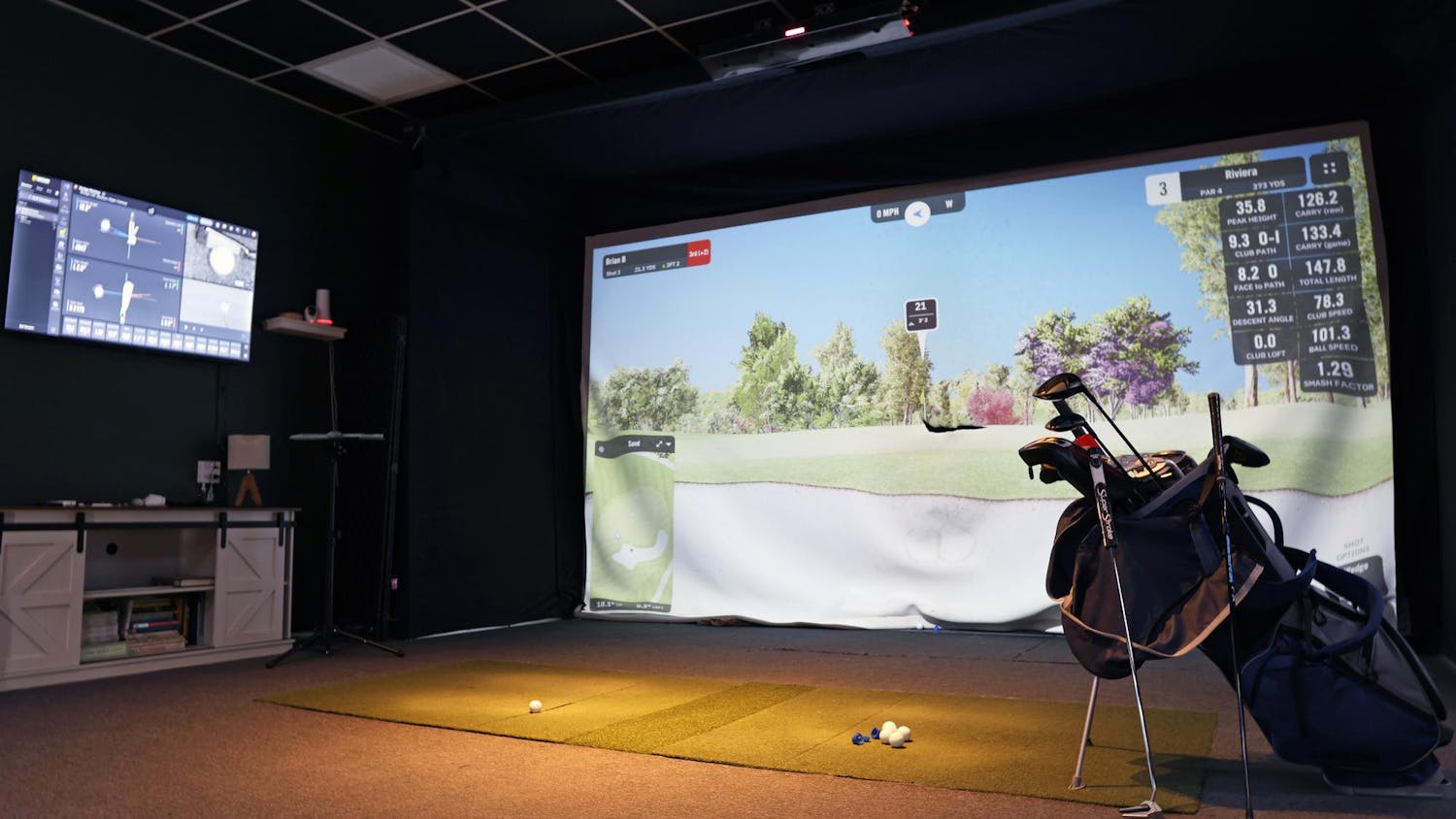 An indoor golf simulator is set up inside Future Country Club in Gainesville, Fla., on Sunday, March 1, 2026.
